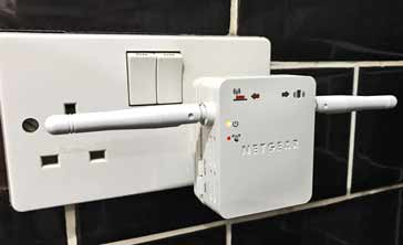 Typical Wi-Fi repeater used to extend the range of a Wi-Fi router in use